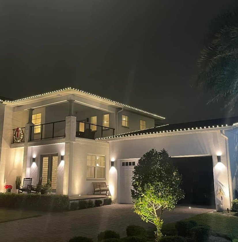 Front yard landscape lighting at night